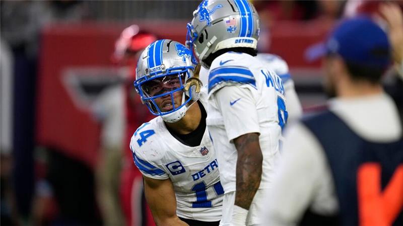 NFL: Siebter Touchdown für St. Brown bei Lions-Sieg Amon-Ra St. Brown (l.) erzielte seinen siebten Touchdown der Saison.