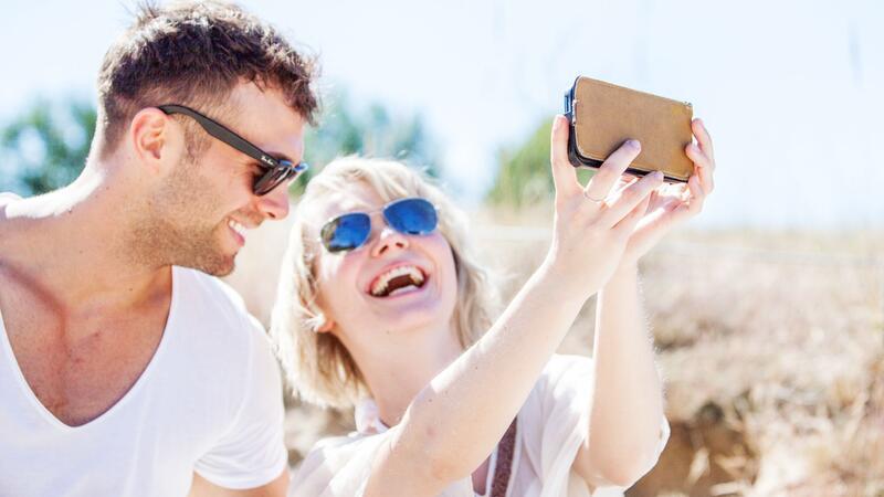 Auch die Reisefotos sollen heute beeindrucken - vor allem auf Social Media.