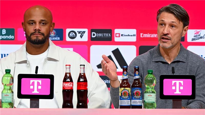 Bayern-Coach Vincent Kompany (l) war zufrieden, BVB-Coach Niko Kovac nicht.