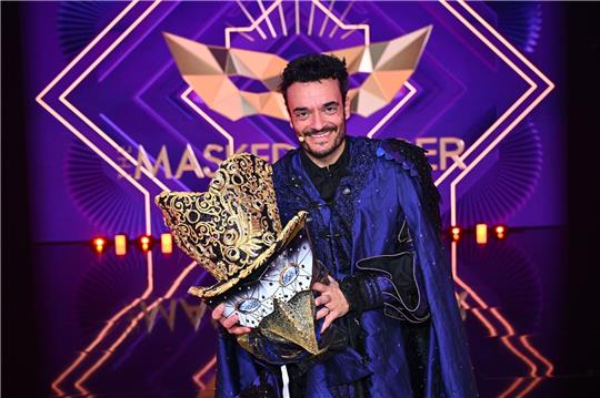 Bei «The Masked Singer» ist ein weiteres «Mysterium» gelöst: Der Sänger, Entertainer und TV-Moderator Giovanni Zarrella lüftete in der ProSieben-Show am Samstagabend die neu eingeführte Maske mit wechselnden Besitzern.