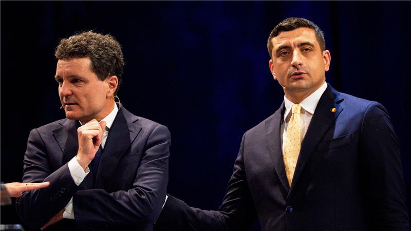 Kopf-an-Kopf-Rennen bei Richtungswahl in Rumänien Bei der Präsidenten-Stichwahl in Rumänien treten der Ukraine-Kritiker George Simion (r.) und der Pro-Europäer Nicusor Dan gegeneinander an.