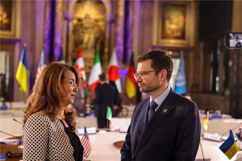 Bundesjustizminister Marco Buschmann (FDP) nimmt an einem Treffen der Justizminister der G7-Staaten teil - an der Seite von Ghada Waly (l), Generaldirektorin des Büros der Vereinten Nationen (UNOV).