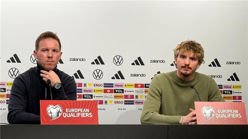 Bundestrainer Nagelsmann (l.) setzt auch auf Nick Woltemade (r.). 