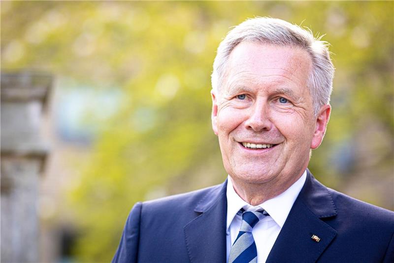 Christian Wulff, ehemaliger Bundespräsident, lächelt.