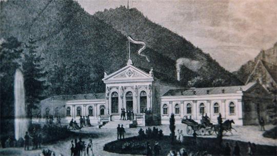 Ein Gebäude auf einer alten, schwarz-weißen Postkarte.