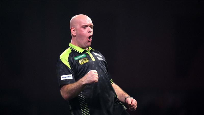 Der Niederländer Michael van Gerwen jubelt.