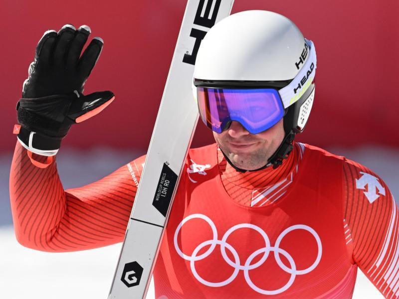 Schweizer Feuz holt Abfahrts-Gold - Schwaiger stürzt schwer Der Schweizer Beat Feuz jubelt im Ziel. Foto: Robert Michael/dpa-Zentralbild/dpa