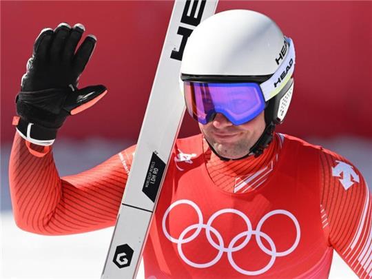 Der Schweizer Beat Feuz jubelt im Ziel. Foto: Robert Michael/dpa-Zentralbild/dpa
