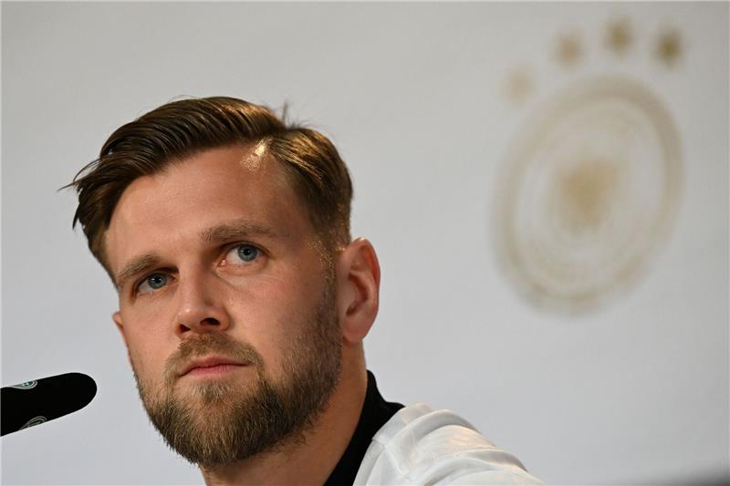 Niclas Füllkrug kritisiert Umgang mit der Nationalmannschaft Deutschlands Niclas Füllkrug spricht auf einer PK.