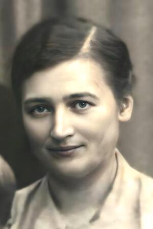 Die Aufnahme zeigt Auguste Müller um das Jahr 1918. Das Bild ist mit künstlicher Intelligenz nachbearbeitet.