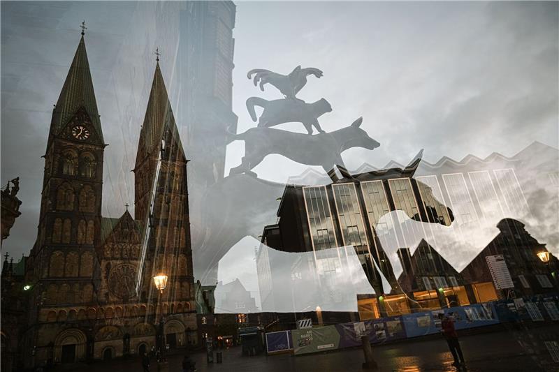 Jazz-Fans aus vielen Ländern treffen sich in Bremen Die Bremer Stadtmusikanten zwischen dem Bremer St.-Petri-Dom und der Bremischen Bürgerschaft.