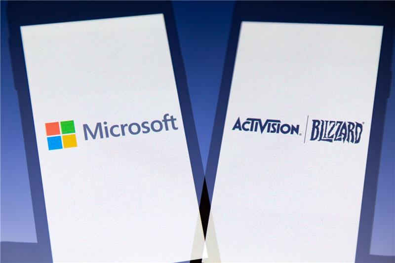 FTC geht gegen Activision-Übernahme durch Microsoft vor Die Logos des amerikanischen multinationalen Technologiekonzerns Microsoft und des Videospielunternehmens Activision Blizzard.