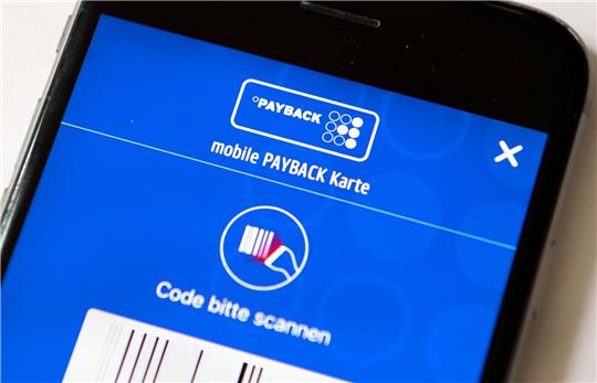 Die Payback-App auf einem Smartphone: Das Unternehmen hat Edeka und die Sparkassen als künftige Partner gewonnen.