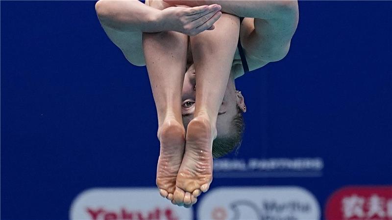 Bilder des Tages Die Schwedin Nina Janmyr auf dem 1-m-Brett bei der Schwimm-WM in Singapur.