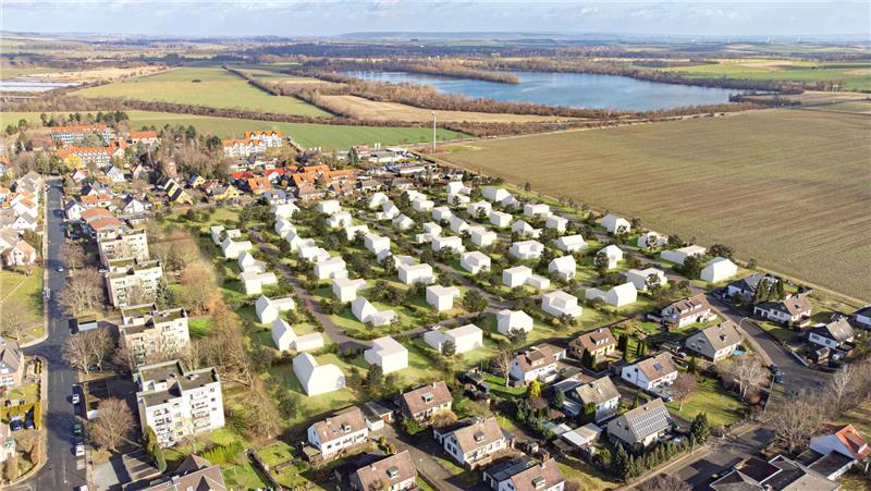 Erster Spatenstich für neues Baugebiet Harzblick Die Visualisierung zeigt, wie sich das neue Baugebiet Harzblick einmal in die bestehende Schladener Bebauung einfügen wird.