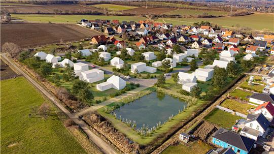 Diese Visualisierung der Niedersächsischen Landesgesellschaft zeigt das Neubaugebiet Kattenbogen, wie es aussehen wird, nachdem es voll besiedelt ist. Zur Orientierung: Links oben ist die Jonaswiese zu sehen, rechts am Bildrand die Häuser aus der ersten Besiedlungsphase des Kirchenfeldes.