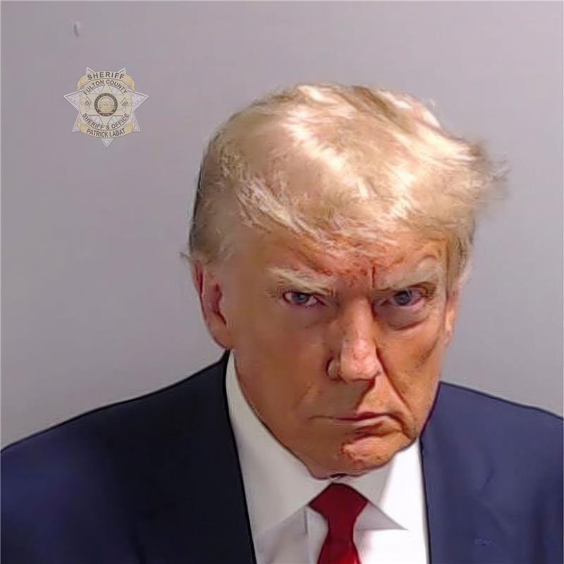 Trump nutzt Polizeifoto für Wahlkampf Dieses vom Fulton County Sheriff's Office zur Verfügung gestellte Foto zeigt Donald Trump nachdem er sich im Fulton County Jail in Atlanta gestellt hat.