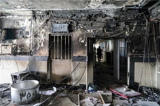 Durch das Feuer zerstörte Werkstatt im Ewin-Gefängnis.