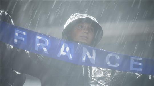 Ein französischer Fan im Regen von Philadelphia.