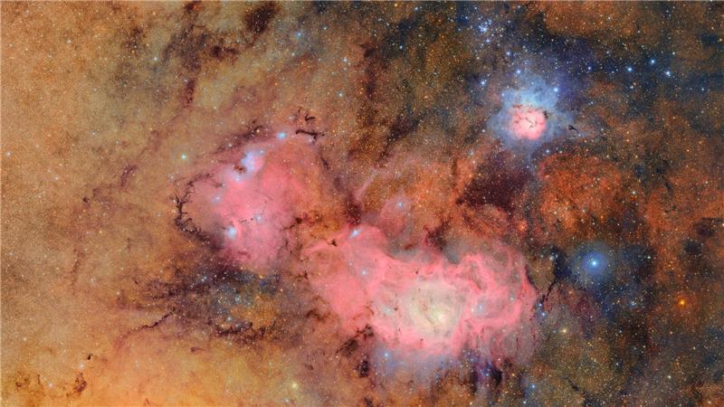 „Rubin“-Observatorium liefert erste Bilder aus dem All Eines der ersten Bilder zeigt den Trifidnebel.