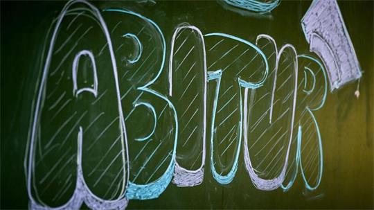 Schwarz-weiße Kreidezeichnung des Wortes 'Abitur' auf einer Tafel