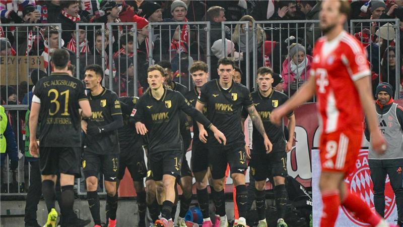 Freude beim FC Augsburg, Enttäuschung bei Harry Kane.