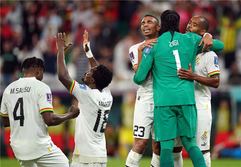 Addo feiert ersten WM-Sieg mit Ghana seit 2010 Ghanas Spieler feiern den Sieg gegen Südkorea.