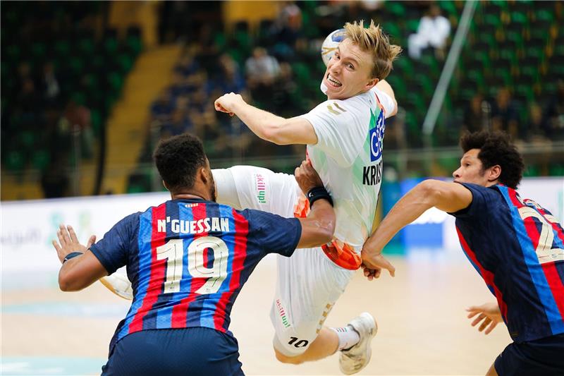 Gisli Kristjansson (M) setzte sich mit Magdeburg gegen den FC Barcelona durch.