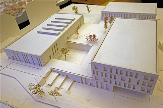 Im Bild sind die drei Gebäudekörper für Hotel (rechts und hinten) sowie die Stadthalle zu sehen. Foto: Epping