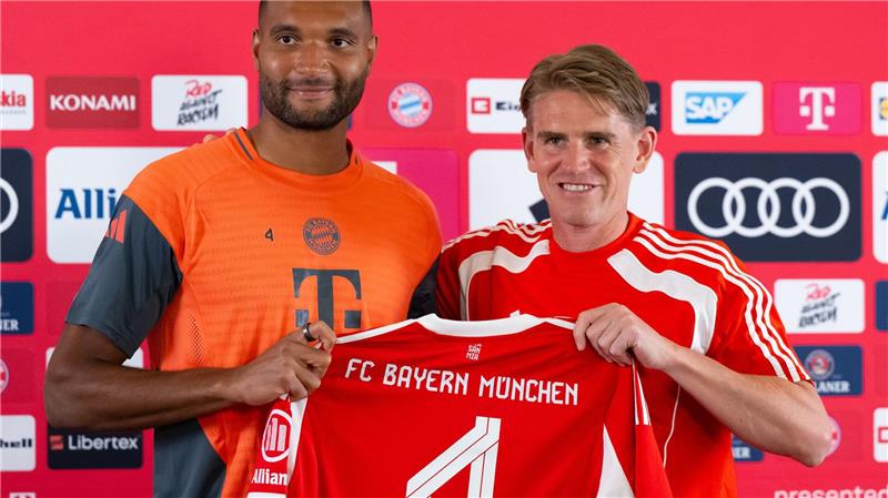 Tah als Abwehrchef: „Die Rolle muss man sich erarbeiten“ Jonathan Tah (l) und Sportdirektor Christoph Freund. Der Nationalspieler wird beim FC Bayern im Trikot mit der Nummer vier auflaufen.