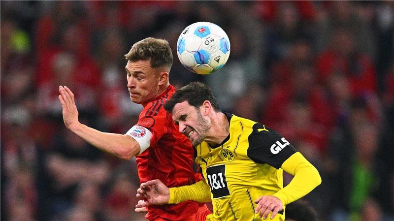 Joshua Kimmich (l) hat eine Forderung an das Bayern-Spiel.