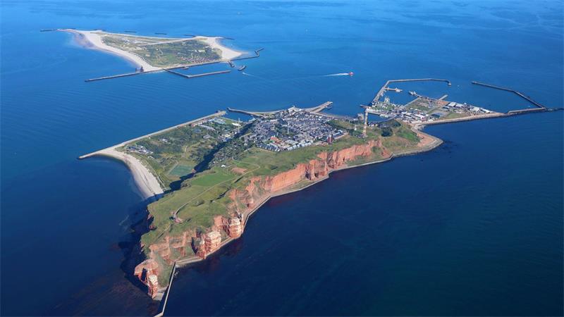 Helgolands Gretchenfrage: getrennt oder vereint? Kann aus der in einer historischen Sturmflut getrennten Insel wieder eins werden?
