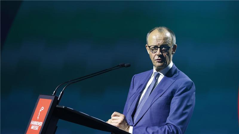 Kanzler Merz muss sich auf der Messe auch Kritik aus der Industrie anhören.