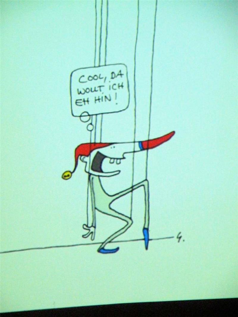 Karikatur „Der Mensch eine Marionette“.