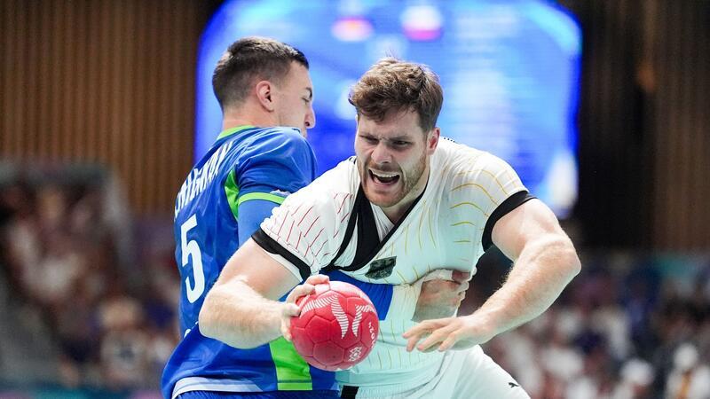 Gruppensieg: Handballer reisen selbstbewusst nach Lille Kreisläufer Johannes Golla kämpfte sich immer wieder durch die slowenische Abwehr.