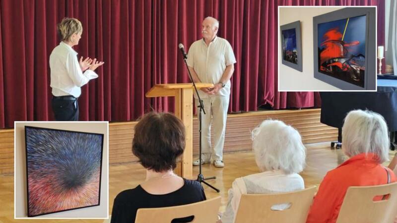 Künstler Hans-Werner Matthias und Kerstin Eilers-Kamarys, Projektkoordinatorin im Mehrgenerationenhaus, während der Ausstellungseröffnung. Gezeigt werden Acrylbilder und Werke aus Emaille.
