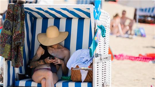 Künstliche Intelligenz kann Touristen auch während ihres Urlaubs unterstützen. (Symbolbild)