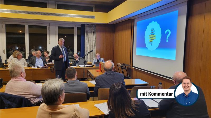 „Raten Sie doch mal, was das für ein Logo ist“ - Bürgermeister Ralf Abrahms macht die Ratssitzung zum Quiz. 