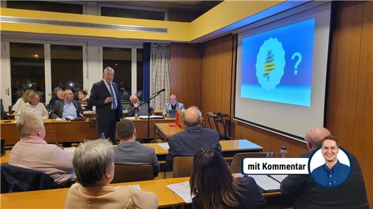 „Raten Sie doch mal, was das für ein Logo ist“ - Bürgermeister Ralf Abrahms macht die Ratssitzung zum Quiz. 