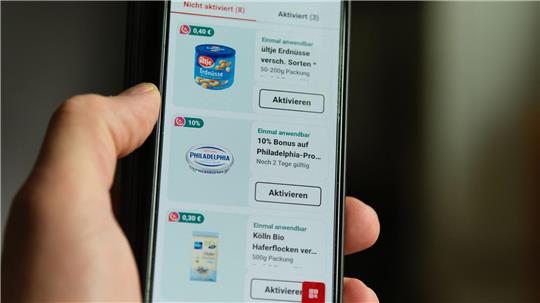Rewe lockt Kunden mit einem Bonus - der Gesamtpreis der betreffenden Produkte wird nicht angezeigt.