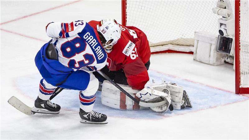USA nach Verlängerungs-Krimi Eishockey-Weltmeister Schweizer-Torhüter Leonardo Genoni zeigte mehrfach sein ganzes Können.