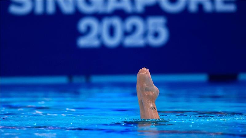 Bilder des Tages Schwimm-WM in Singapur - Synchronschwimmen: Audrey Lamothe (Kanada) tritt bei den Weltmeisterschaften im Wasserspringen im technischen Einzelwettbewerb der Frauen an.