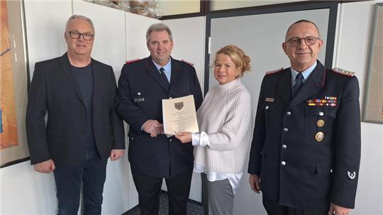 Tim Meißner (v.l.), Heiko Hartmann, Urte Schwerdtner und Christian Hellmeier bei der Ernennungs-Zeremonie.