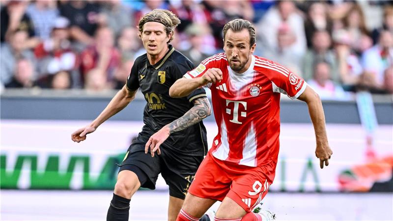 „Nicht perfekt“: Bayern bezwingen Wagners Augsburger Torjäger Harry Kane traf 100. Pflichtspiel für die Bayern nicht selbst, legte aber zwei Treffer auf.
