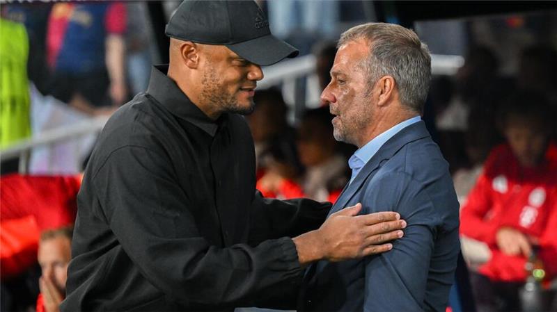 Verlierer Vincent Kompany (l) und Sieger Hans Flick (r). 