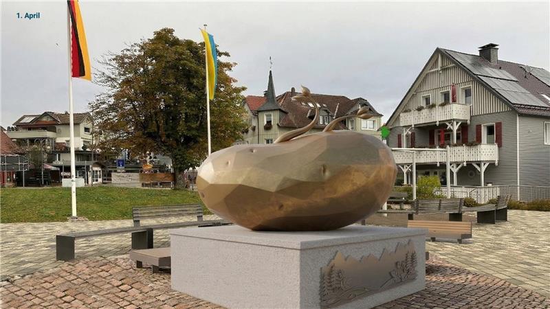 Das Foto zeigt eine riesige goldene Kartoffel auf dem Platz Neue Mitte in Braunlage.