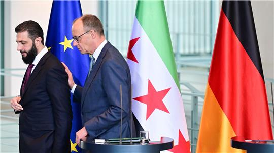 Wer hat die 80-Prozent-Zielmarke genannt, Syriens Übergangspräsident Ahmed al-Scharaa oder Kanzler Friedrich Merz (CDU)? Nicht so wichtig, meint die Bundesregierung.