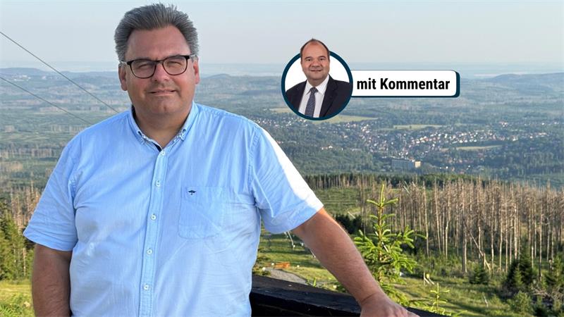 Das Foto zeigt einen Mann auf einem Berg.