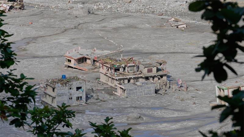 Eine „Warnung an die Welt“: Nepalesen kämpfen ums Überleben Zerstörter Häuser nach der Sturzflut in Nepal. (Archivbild)