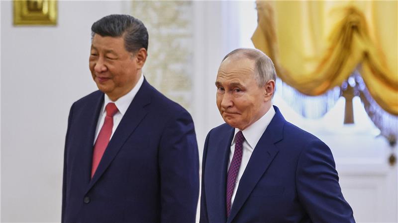 Putin und Xi bekräftigen in Moskau enge Partnerschaft Zufriedene Gesichter bei Xi und Putin.